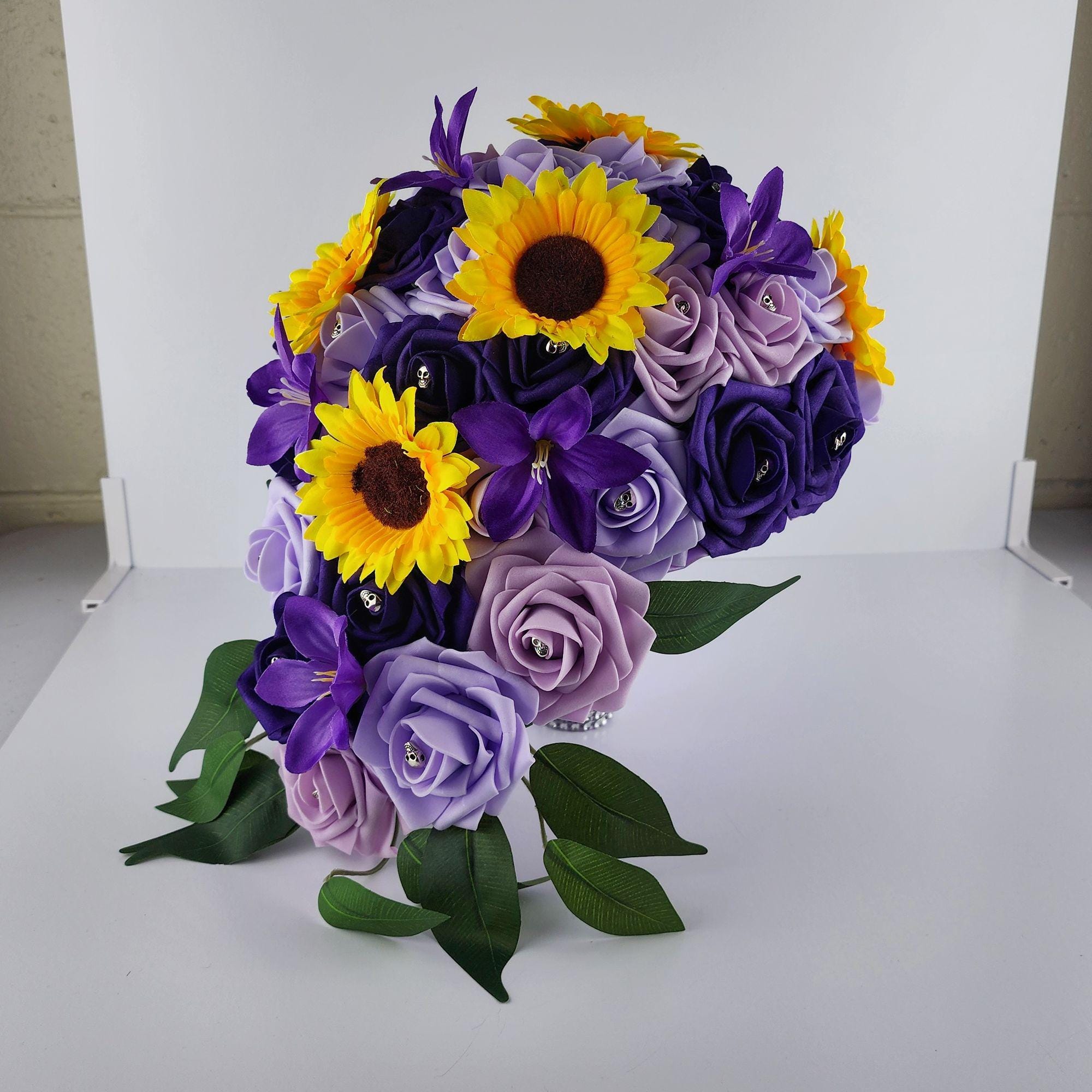 Gothic Skull Cascading Wedding Bouquet With Lilac, Lavender, and Dark Purple Roses, Lilies and Sunflowers.