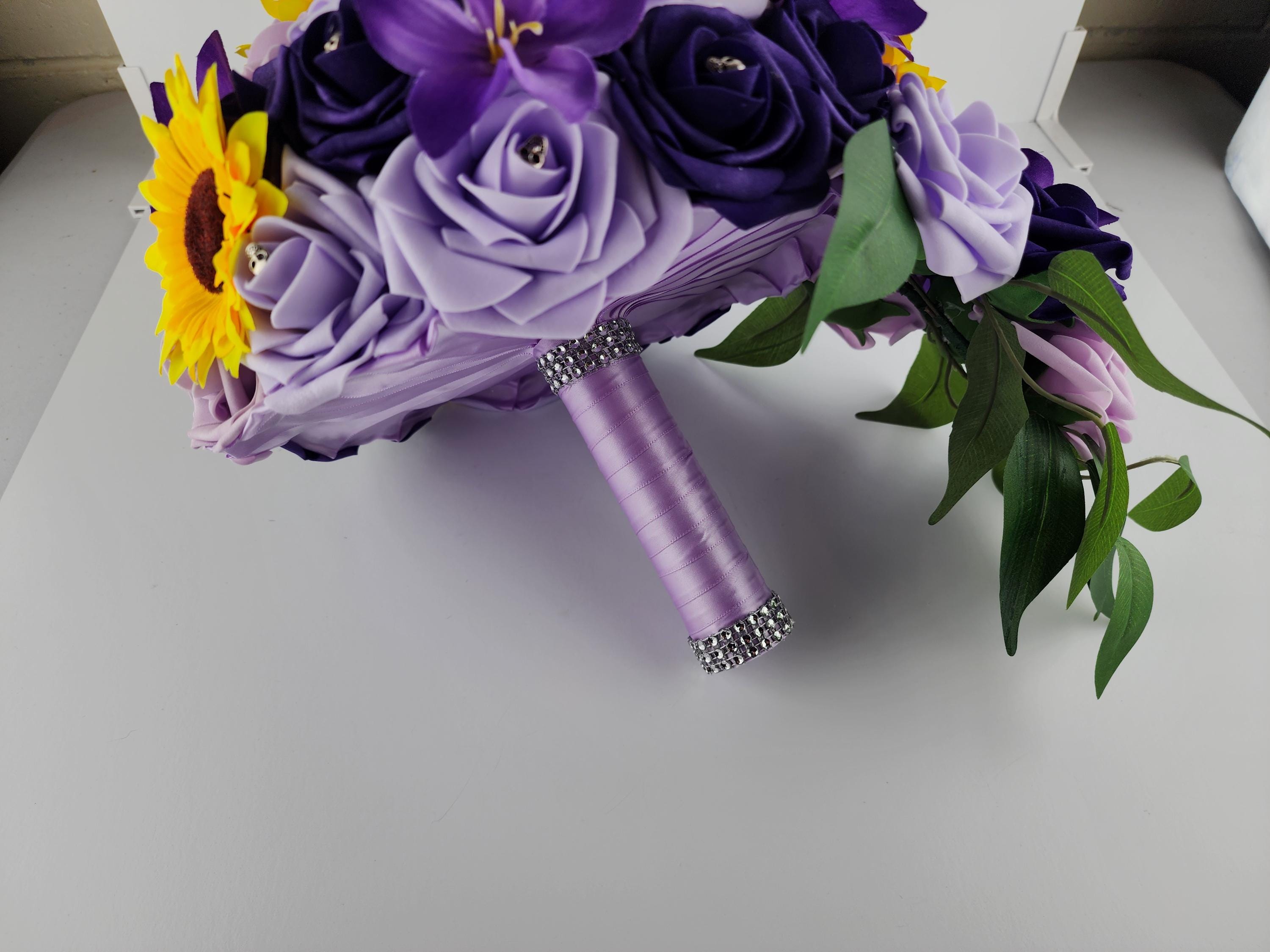 Gothic Skull Cascading Wedding Bouquet With Lilac, Lavender, and Dark Purple Roses, Lilies and Sunflowers.
