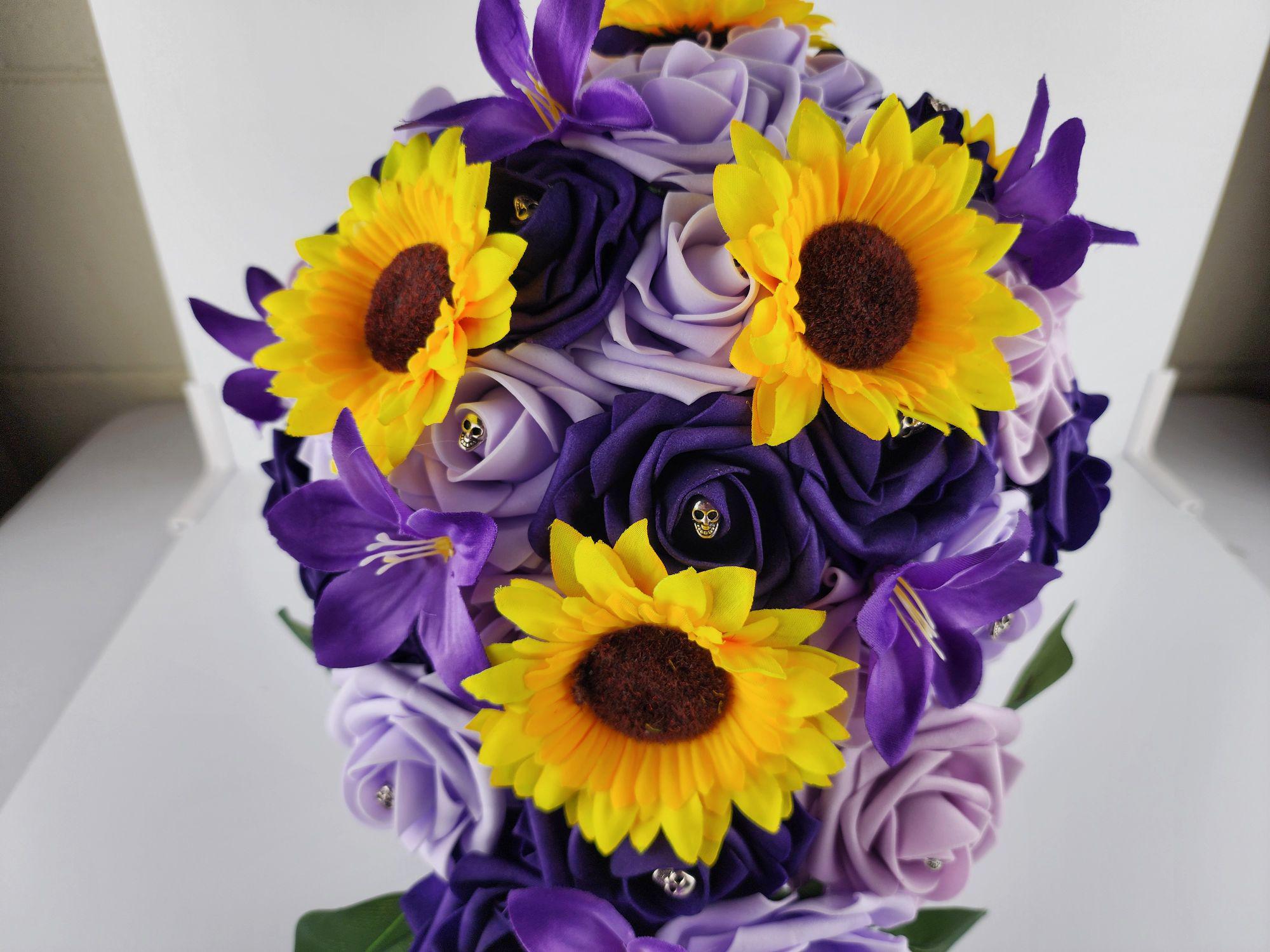 Gothic Skull Cascading Wedding Bouquet With Lilac, Lavender, and Dark Purple Roses, Lilies and Sunflowers.