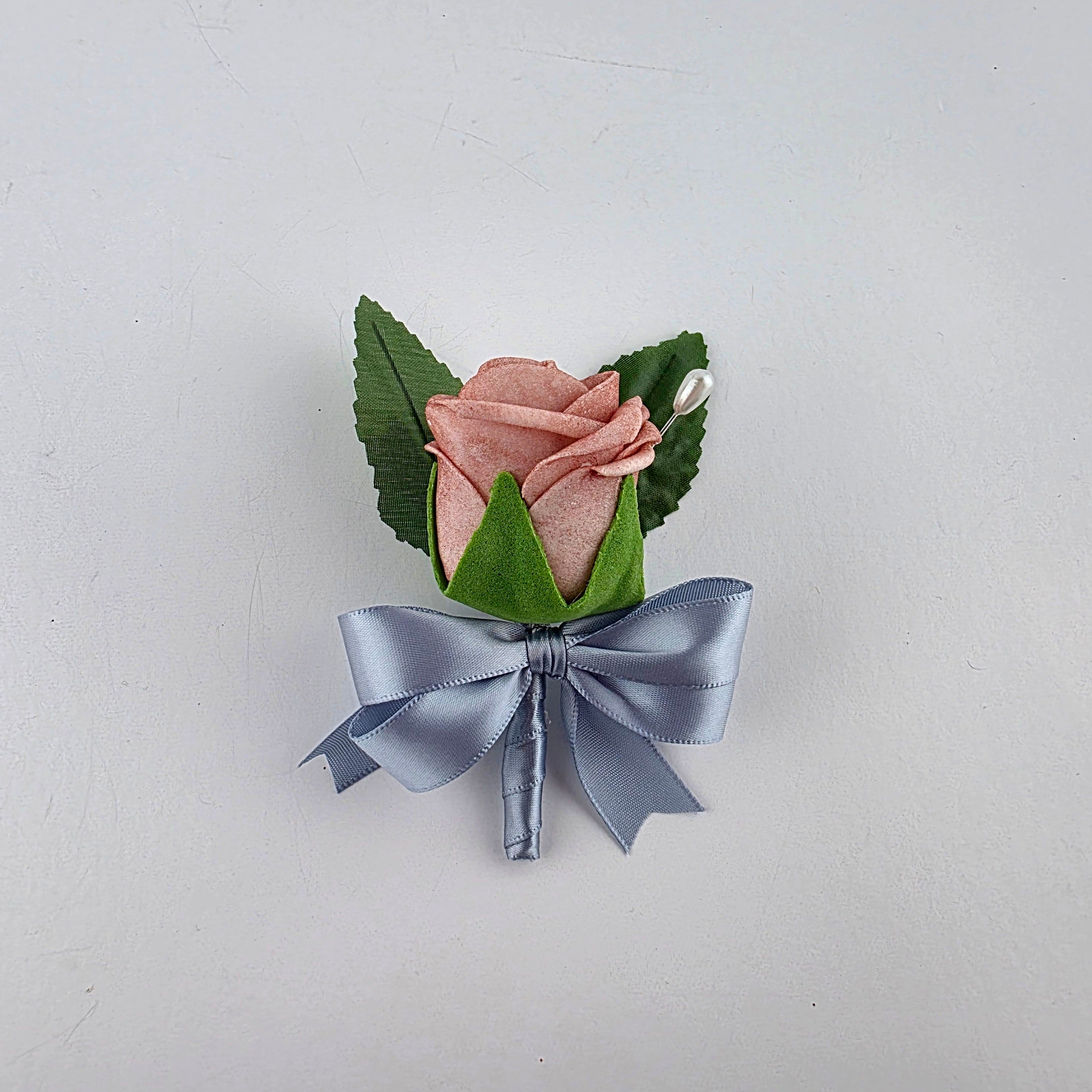 Dusty rose and dusty blue boutonniere