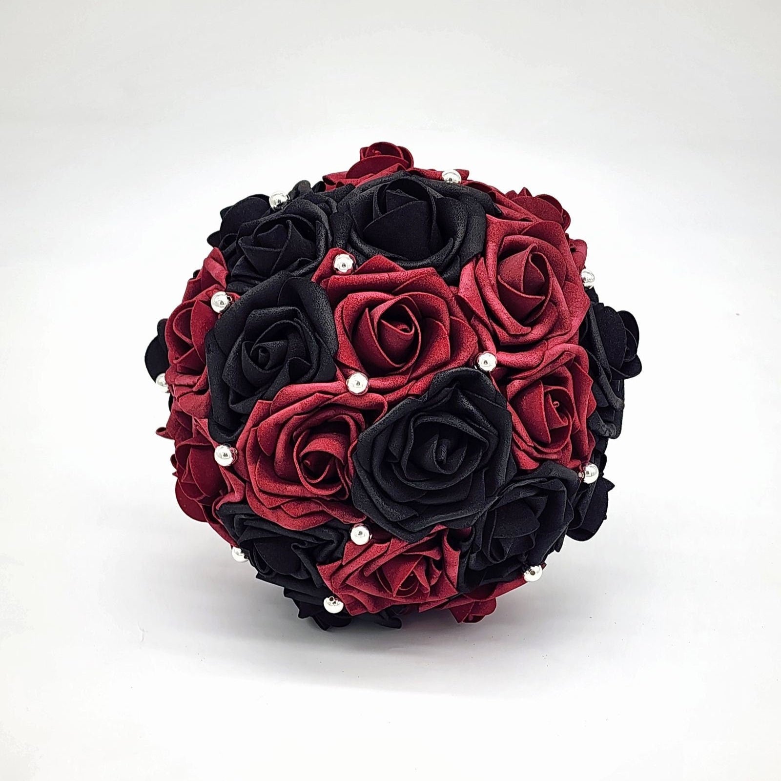 Front view of bouquet shows round bouquet