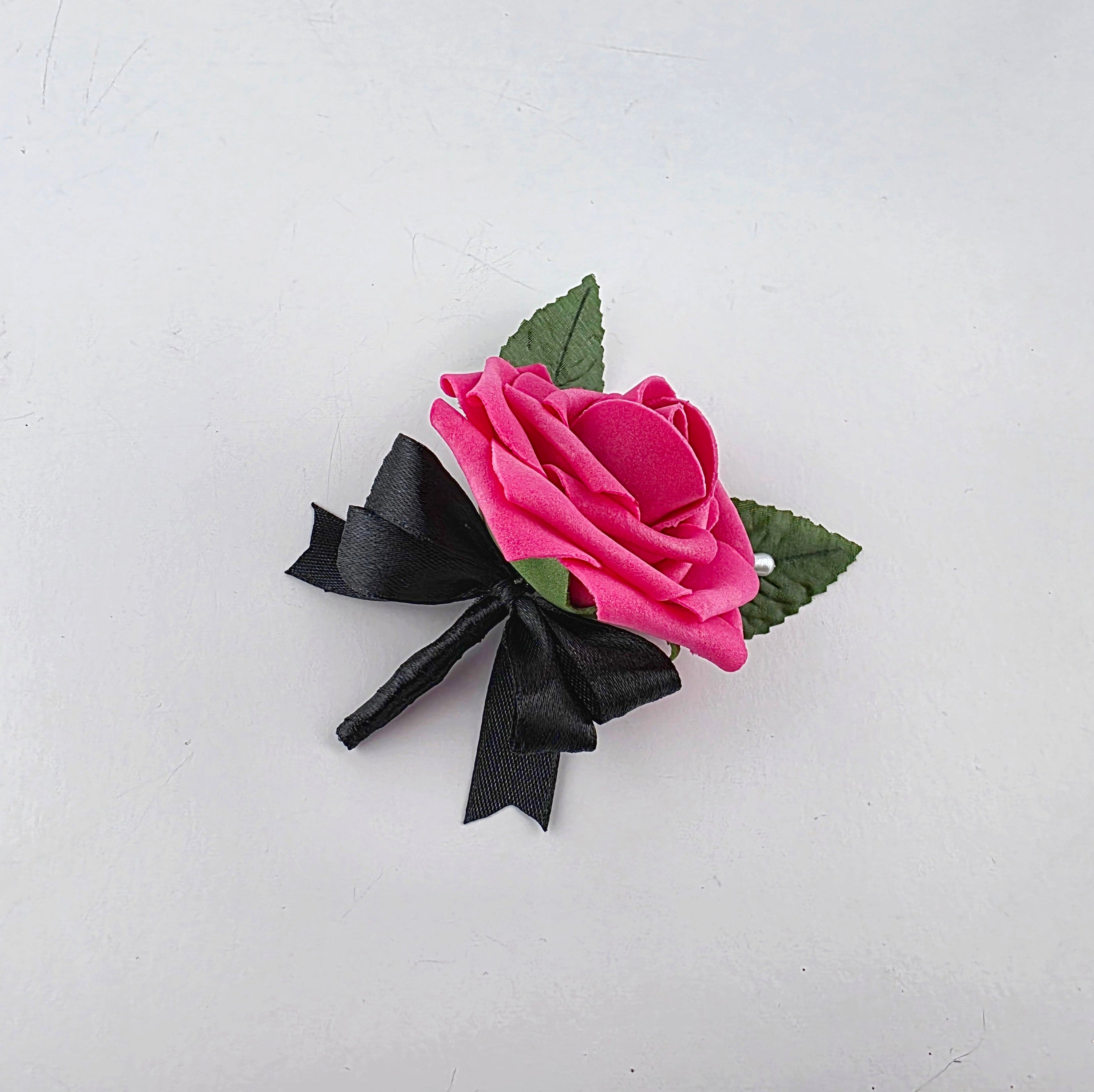 Hot pink and black boutonniere
