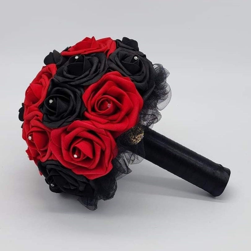 Red and Black wedding bouquet with rhinestones on every rose. handle is made up of black tulle and satin ribbon and finished with silver brooch