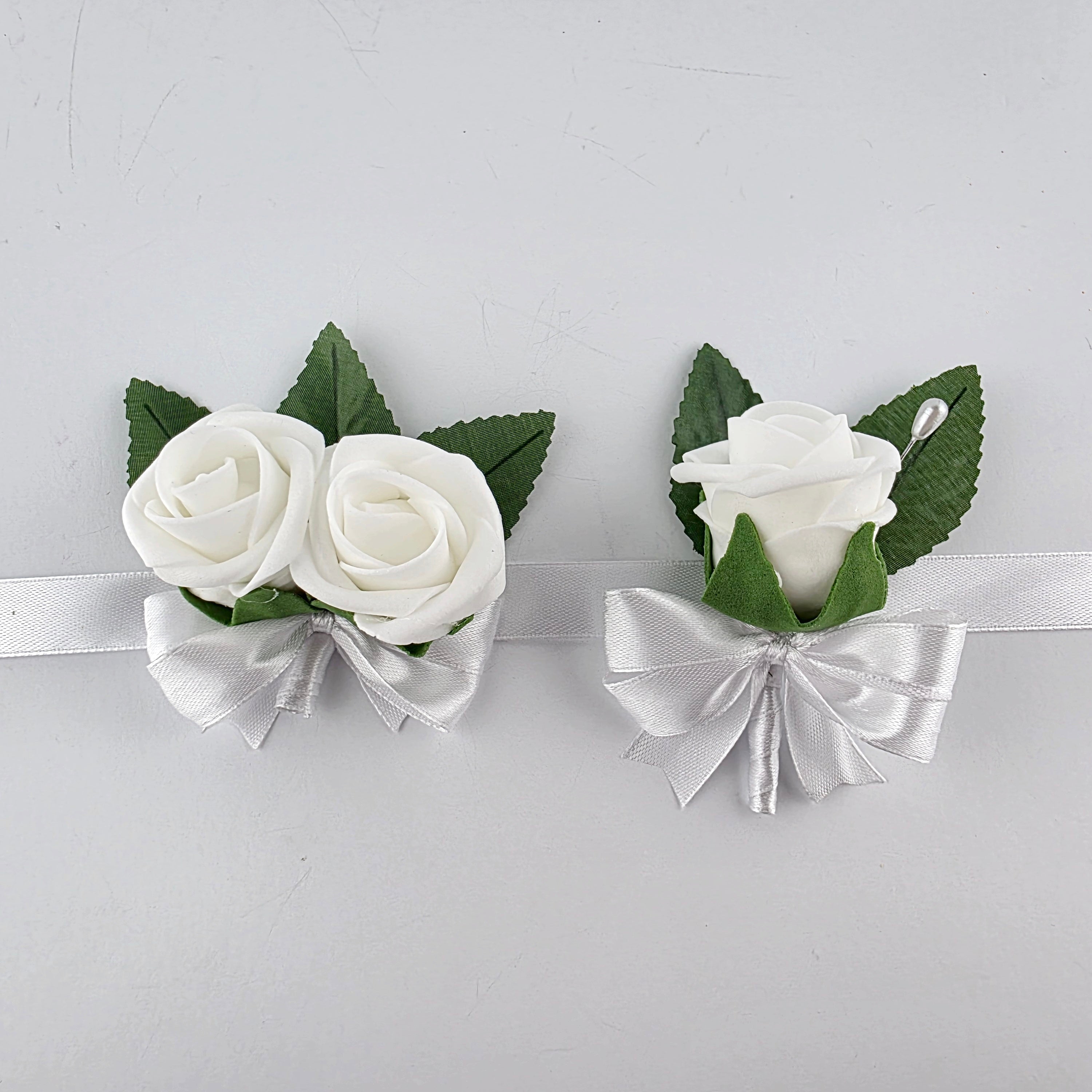 white kids wrist corsage and boutonnieres
