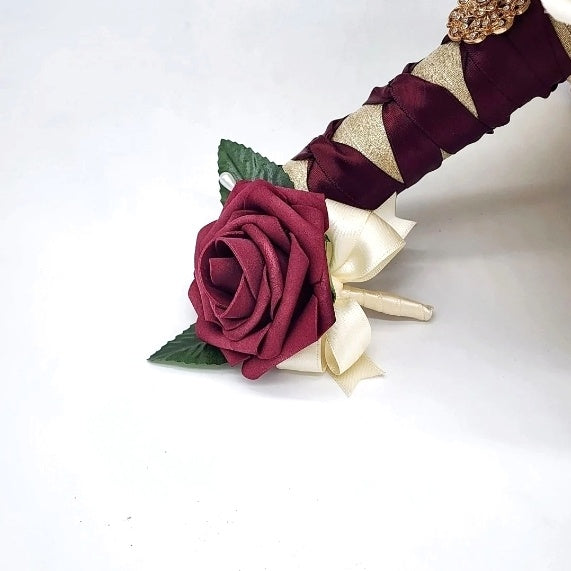 burgundy and ivory boutonniere