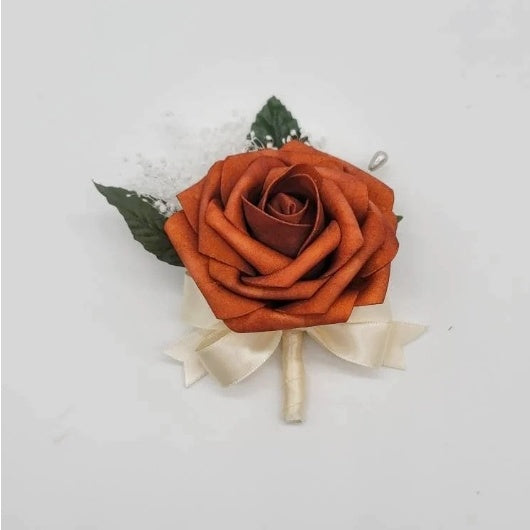 burnt orange and ivory boutonniere