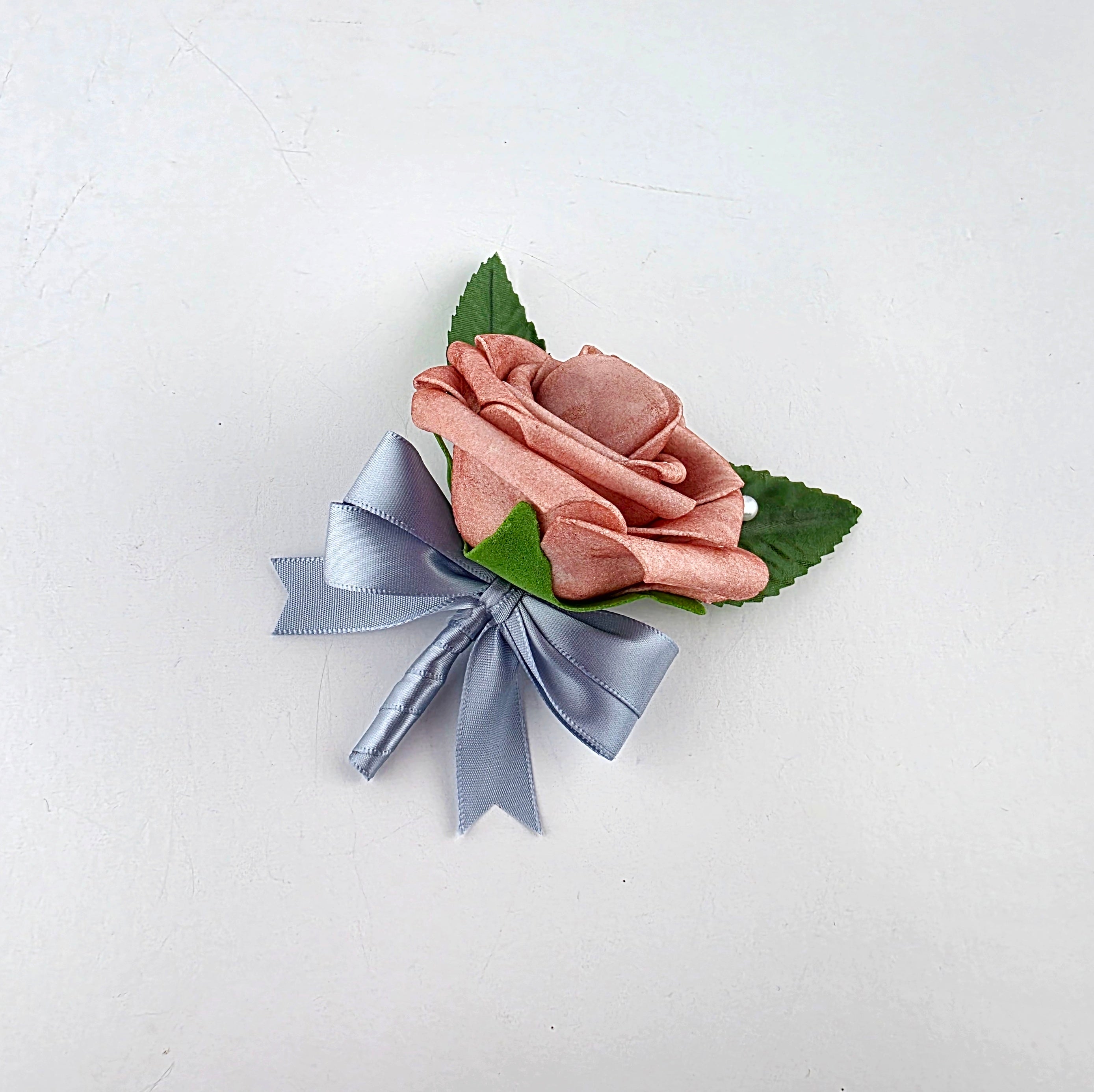 dusty rose and dusty blue boutonniere