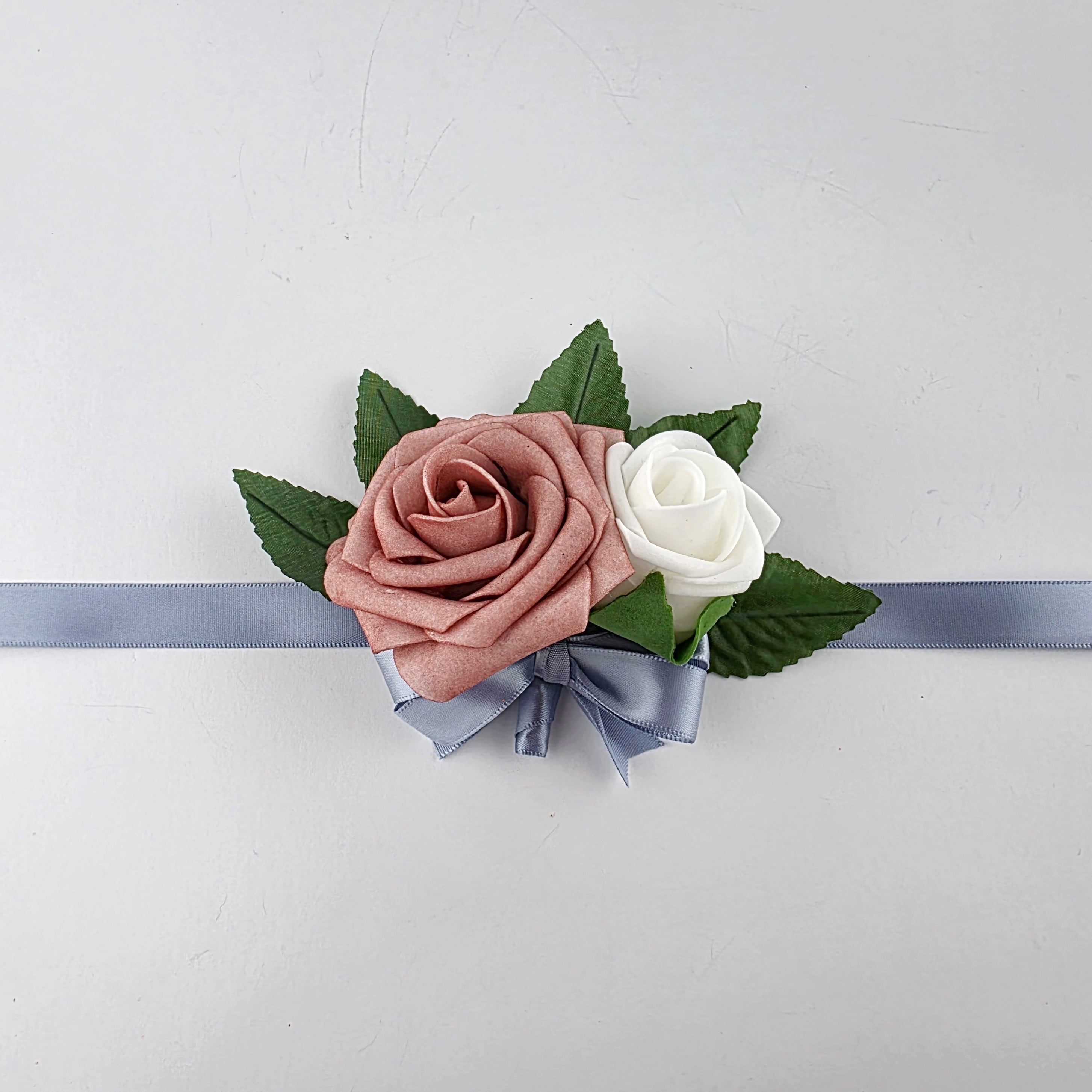 dusty rose and white wrist corsage