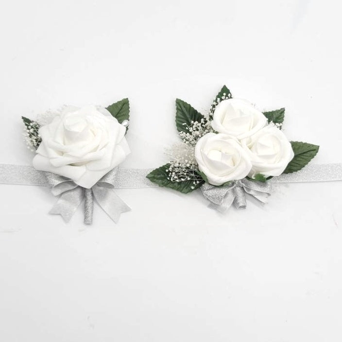 pair of boutonniere and corsage