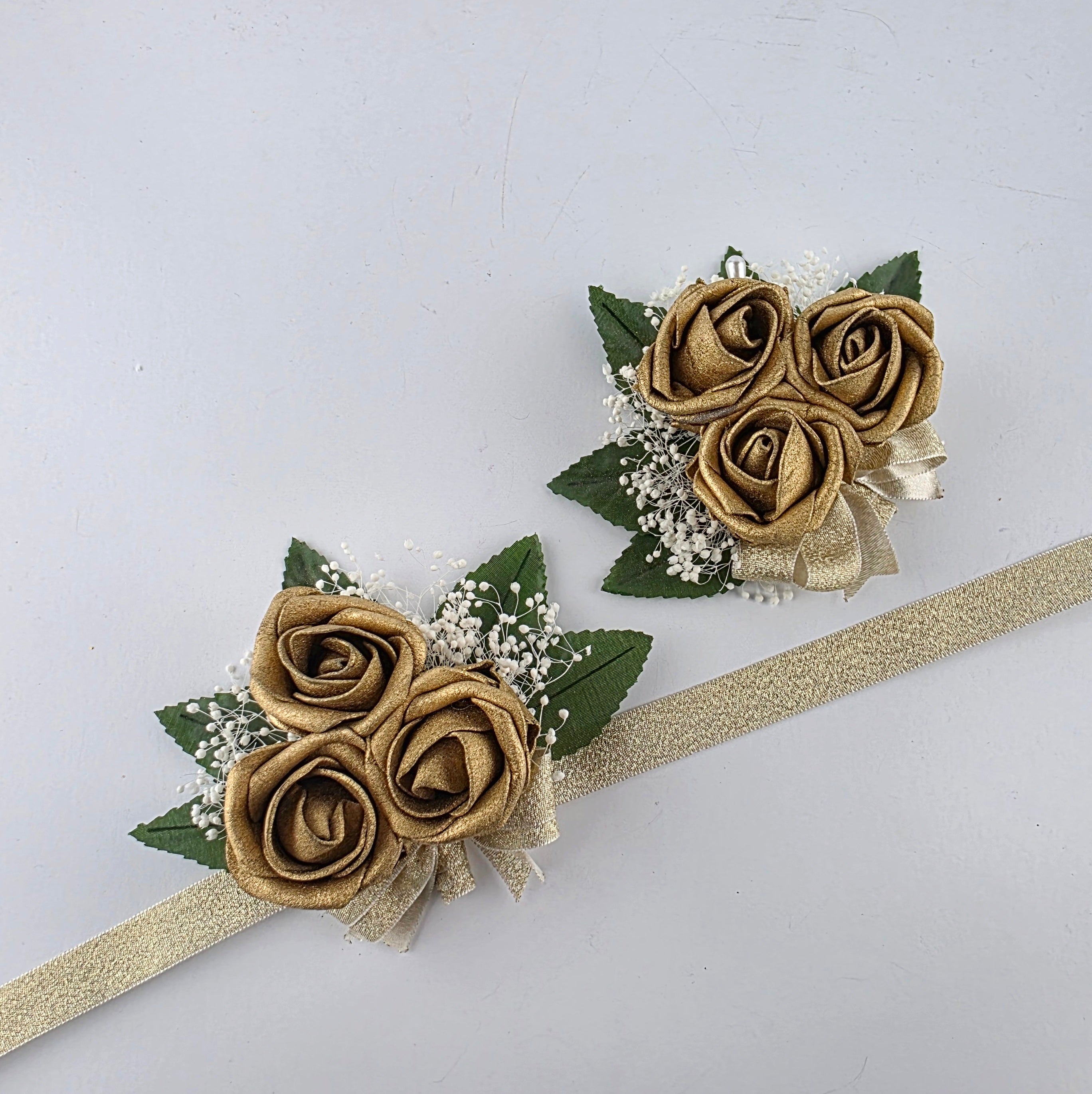 pin on and wrist corsage in all gold