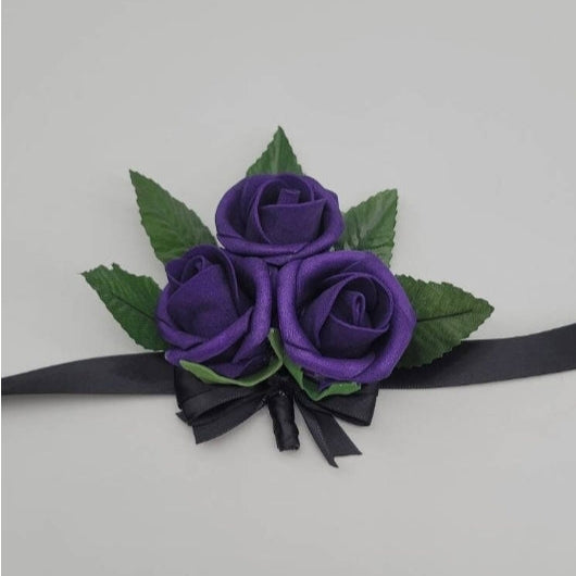 purple and black corsage