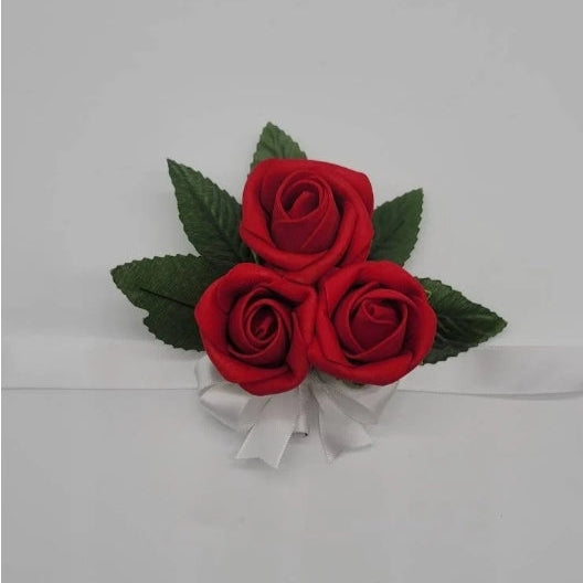 red and white wrist corsage