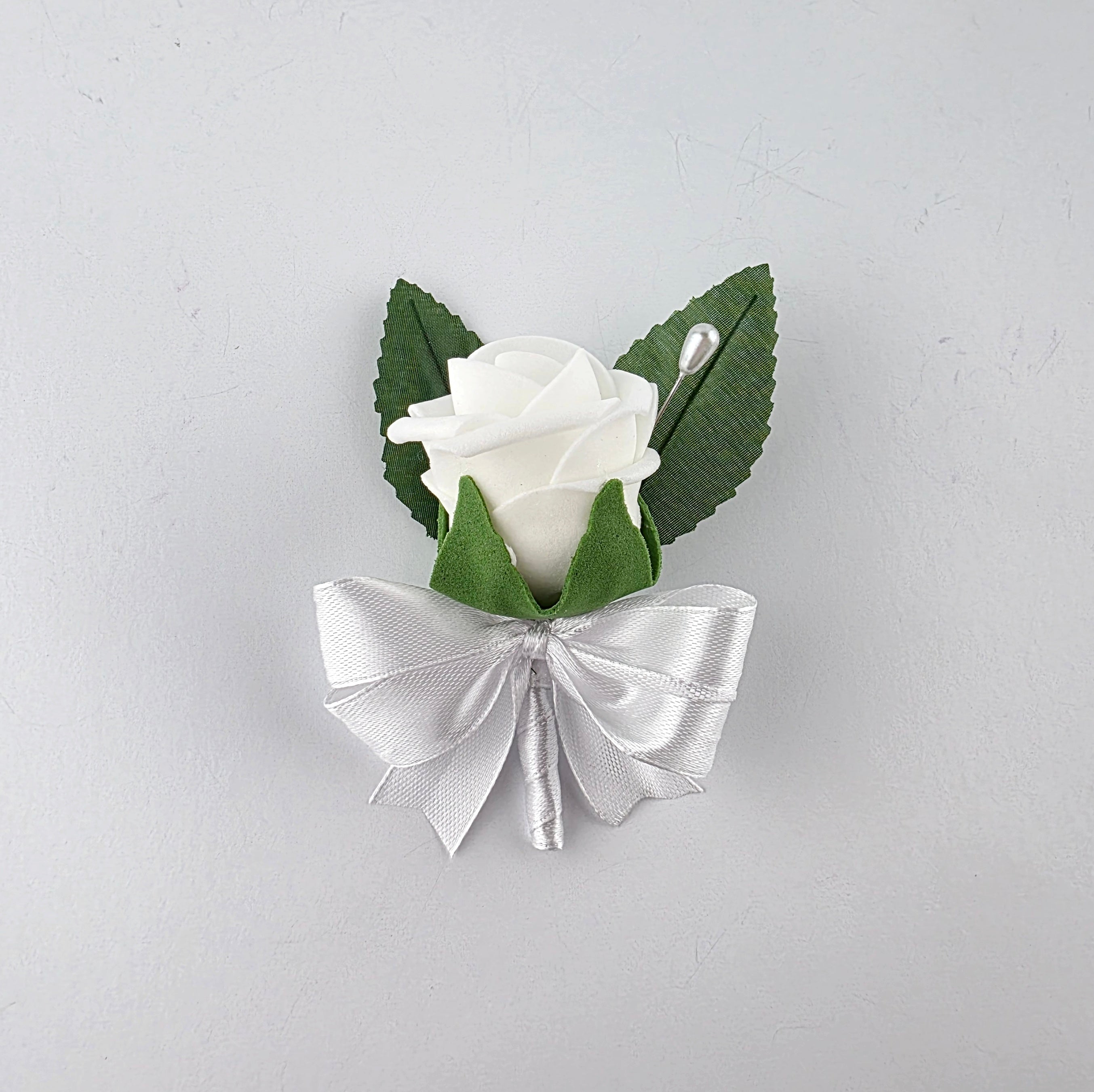 white childrens boutonnieres