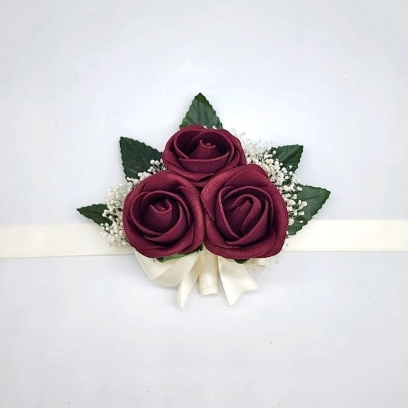 wrist corsage burgundy and ivory 